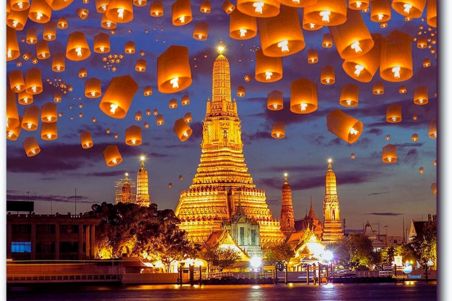 Lanterns floating over Wat Arun temple at night Bangkok – Auasia Travel